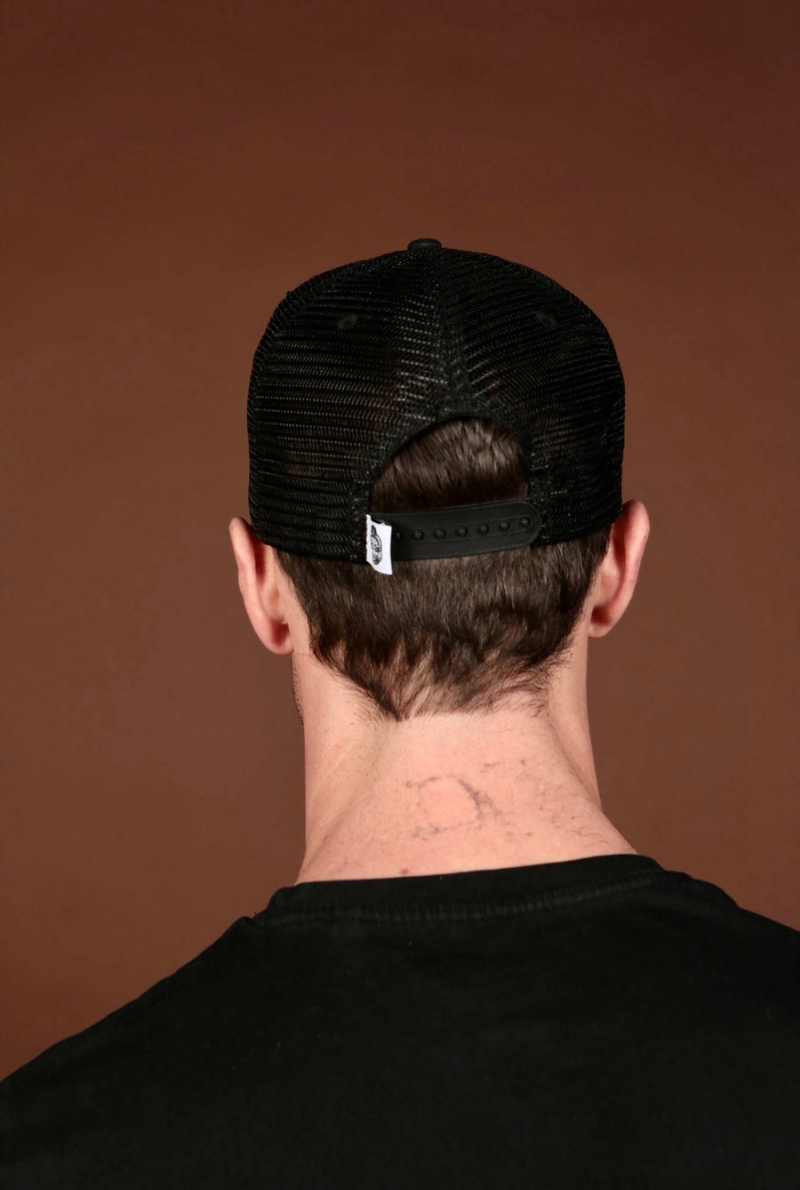 Black Olokun Varsity Mesh Cap with a slightly Curved Peak